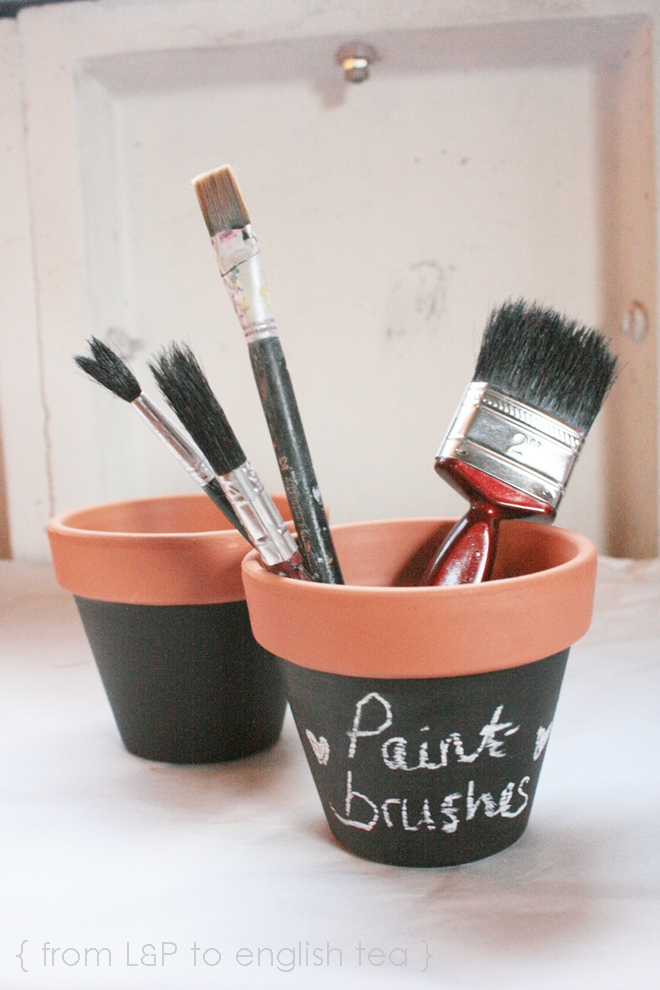 DIY blackboard pots with paintbrushes in them